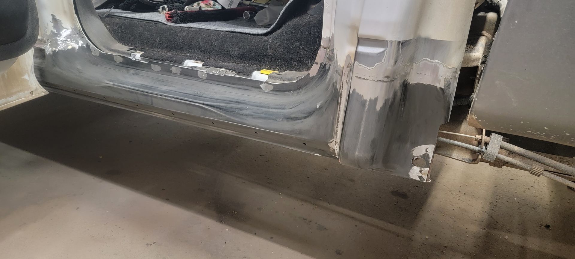 a close up of a car door with a lot of dust on it