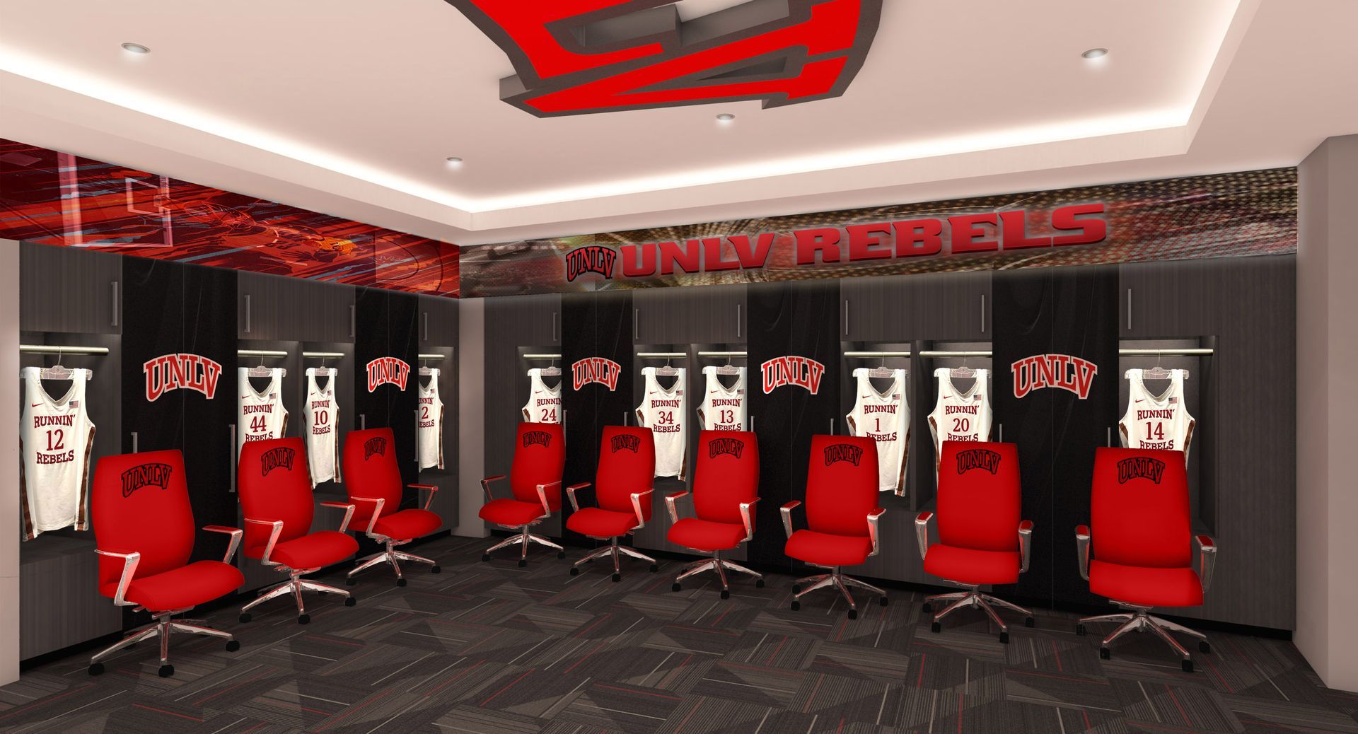 A locker room with red chairs and a sign that says ainly rebels