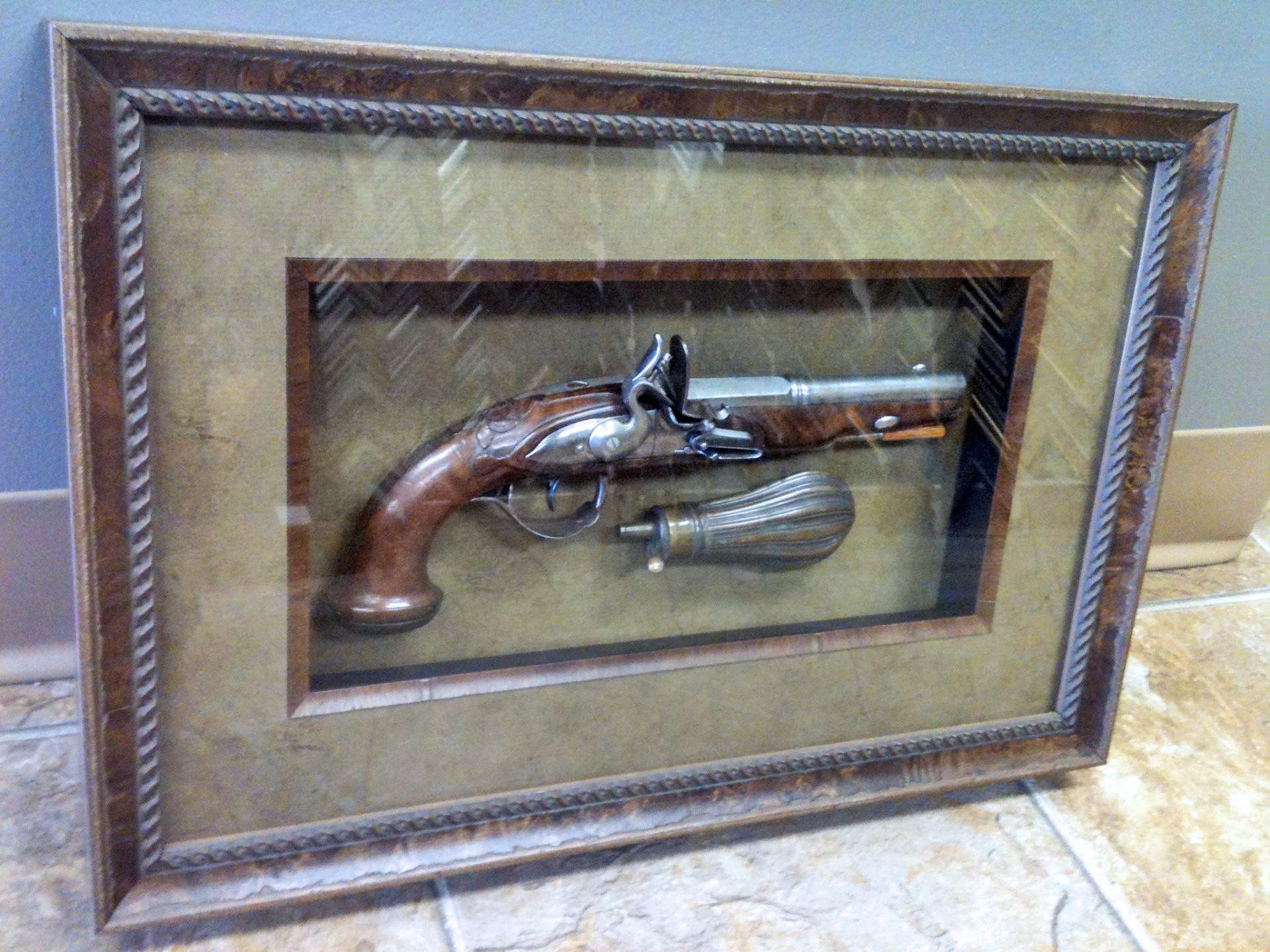 Gun in shadowbox