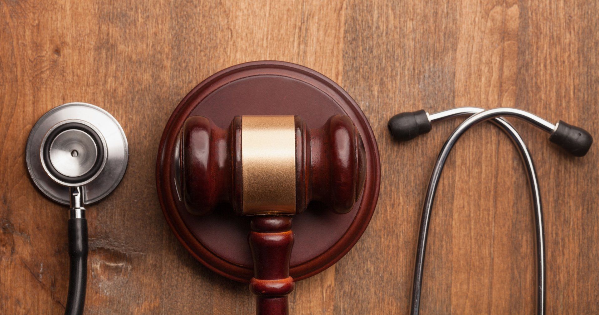 Stethoscope and law gavel