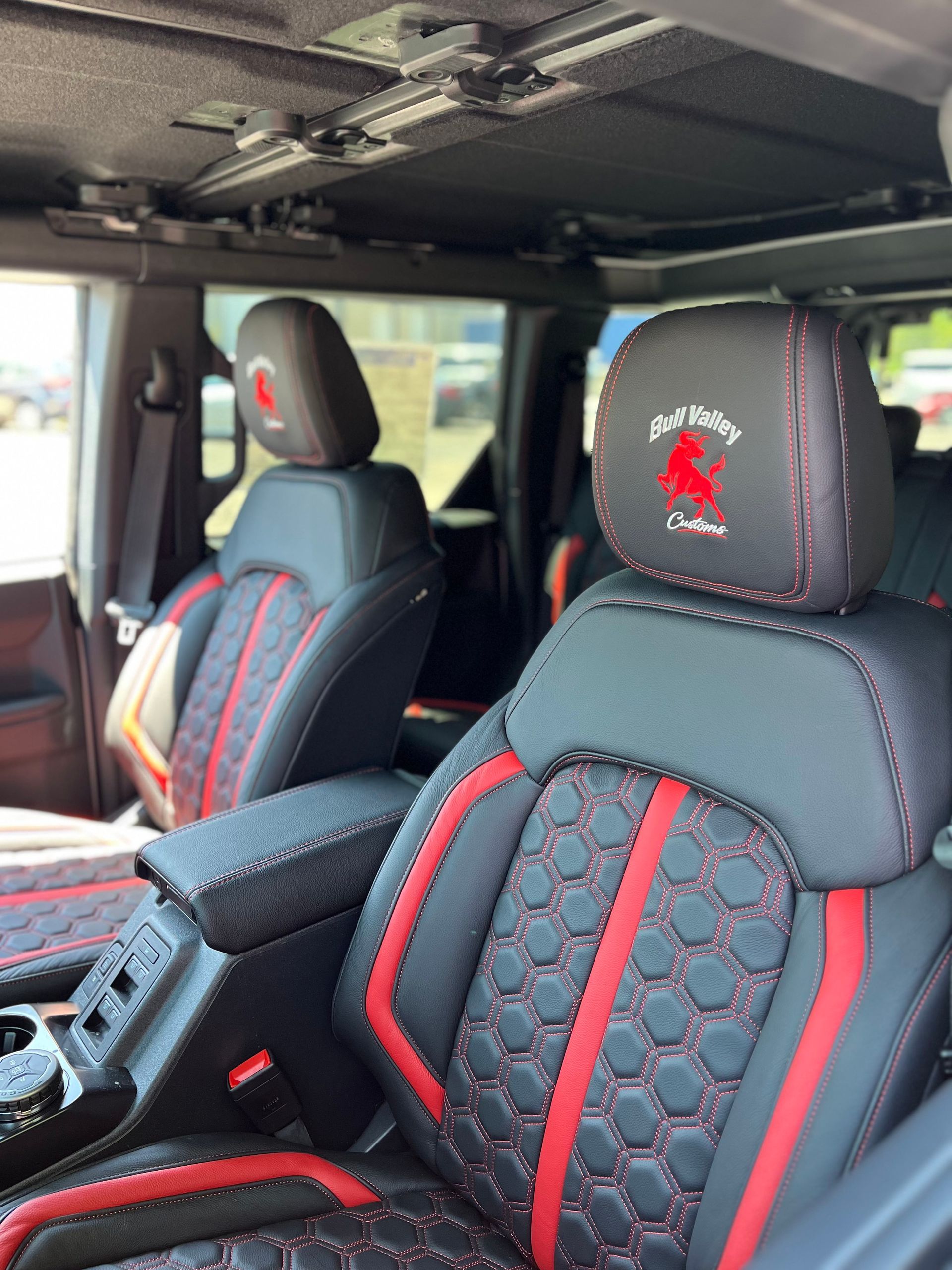 Customized car interior with sporty bucket seats and patterned seat covers