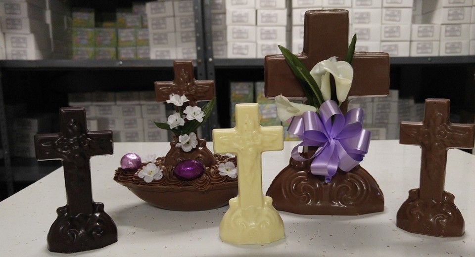 A group of chocolate crosses are sitting on a table