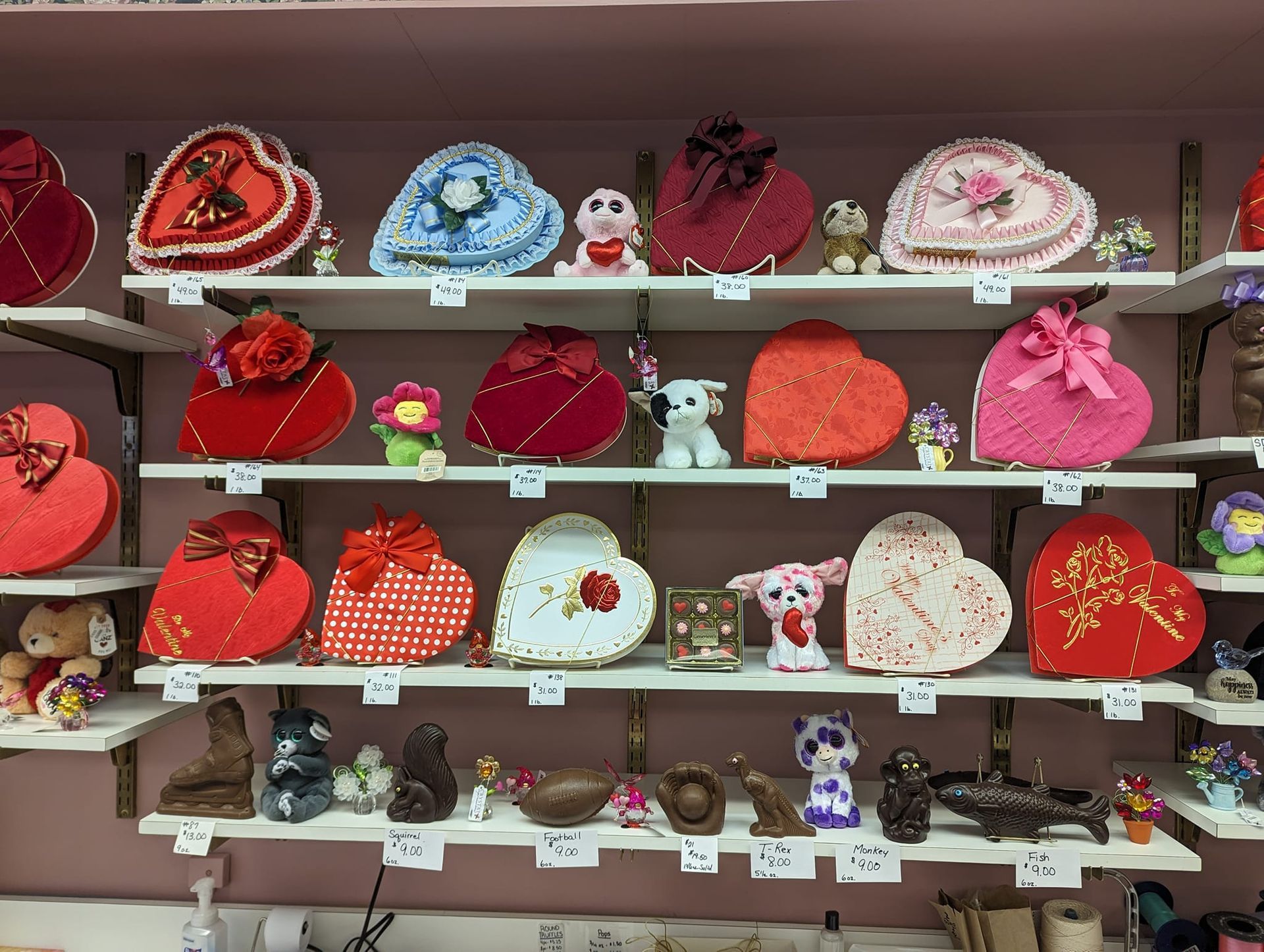 A display of valentine 's day gifts on shelves