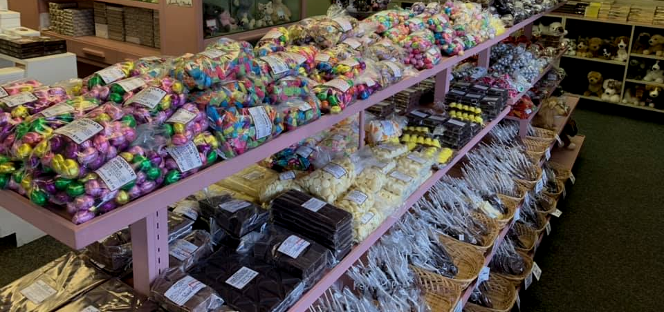 A candy store filled with lots of different types of candy.