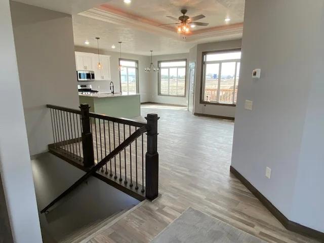 A house with a staircase leading up to the second floor