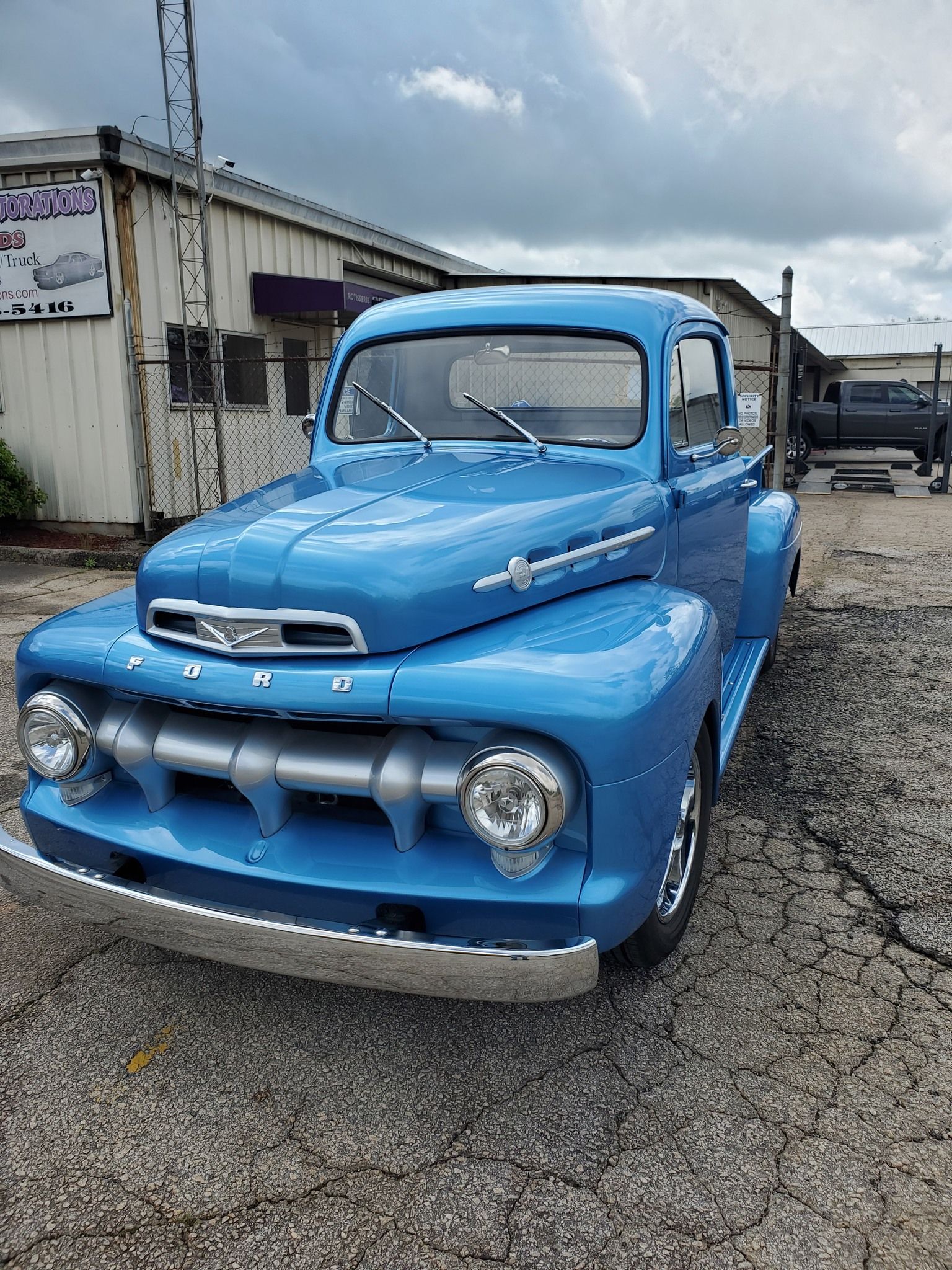 A blue ford truck