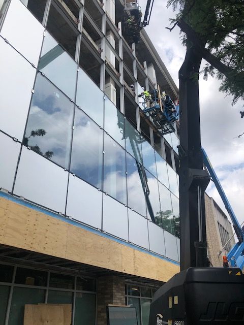 A building with a lot of windows is being built