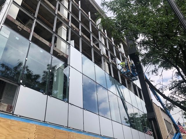 A building with a lot of windows is being built