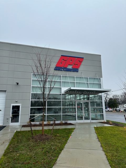 A large building with a sign that says gps on it
