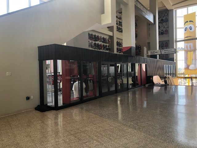 A large building with a lot of windows and doors