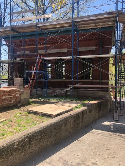A building under construction with scaffolding around it