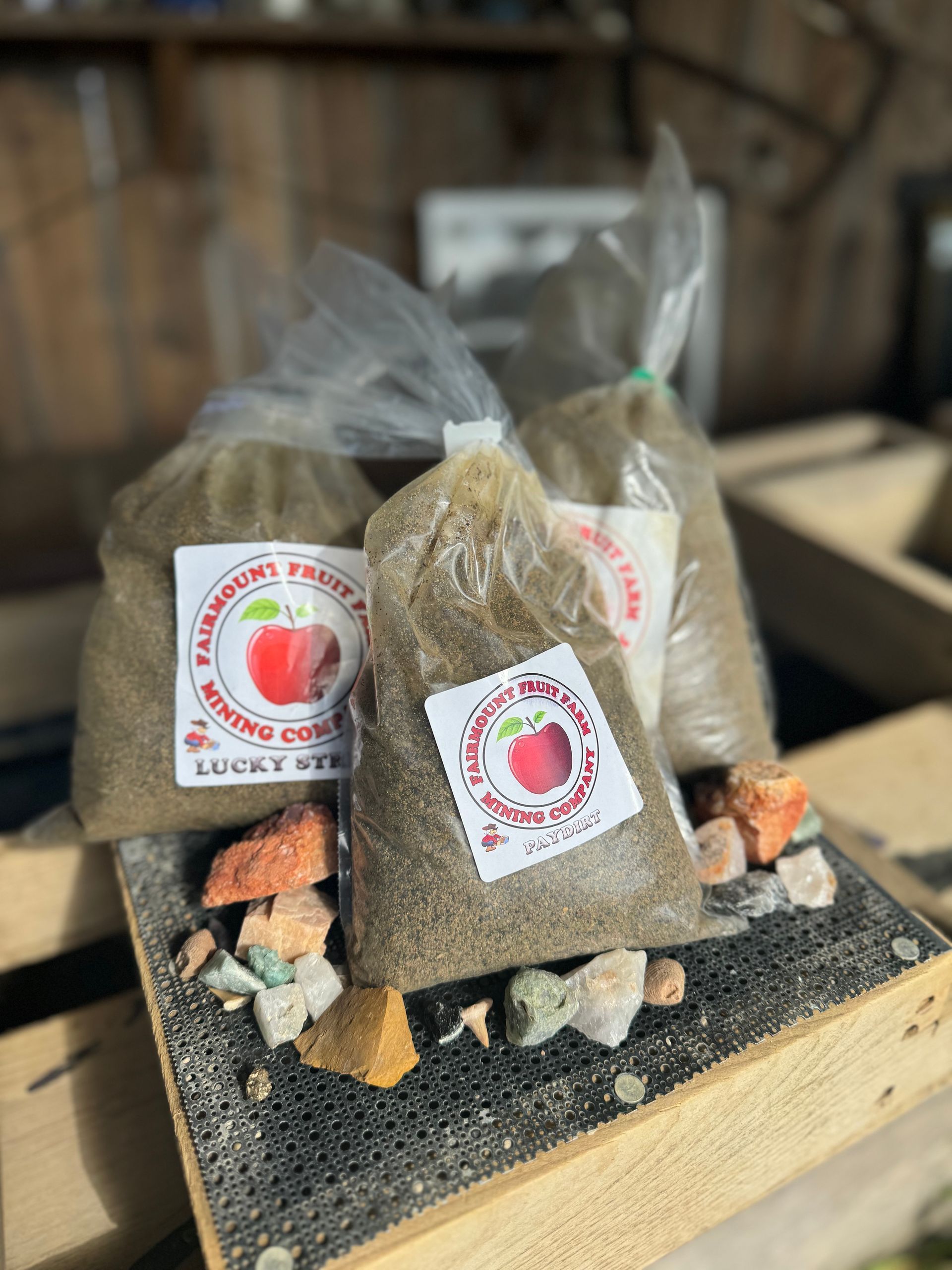 A food truck with ice cream cones on it is parked in front of a house.