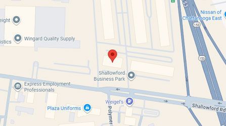 Map showing Shallowford Business Park, located near a highway and commercial buildings. A red marker indicates a specific location.
