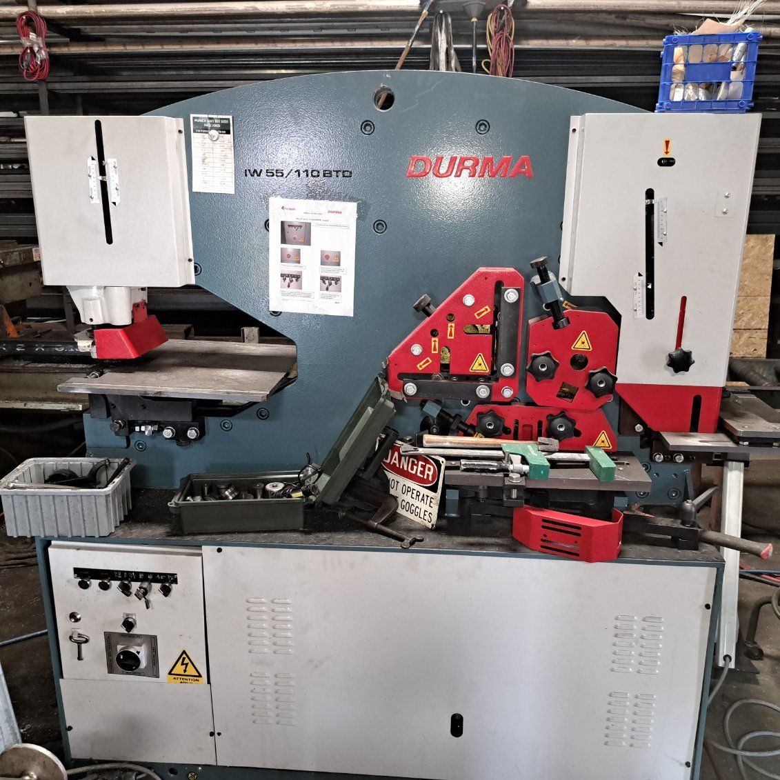 A machine is sitting on a table in a factory.