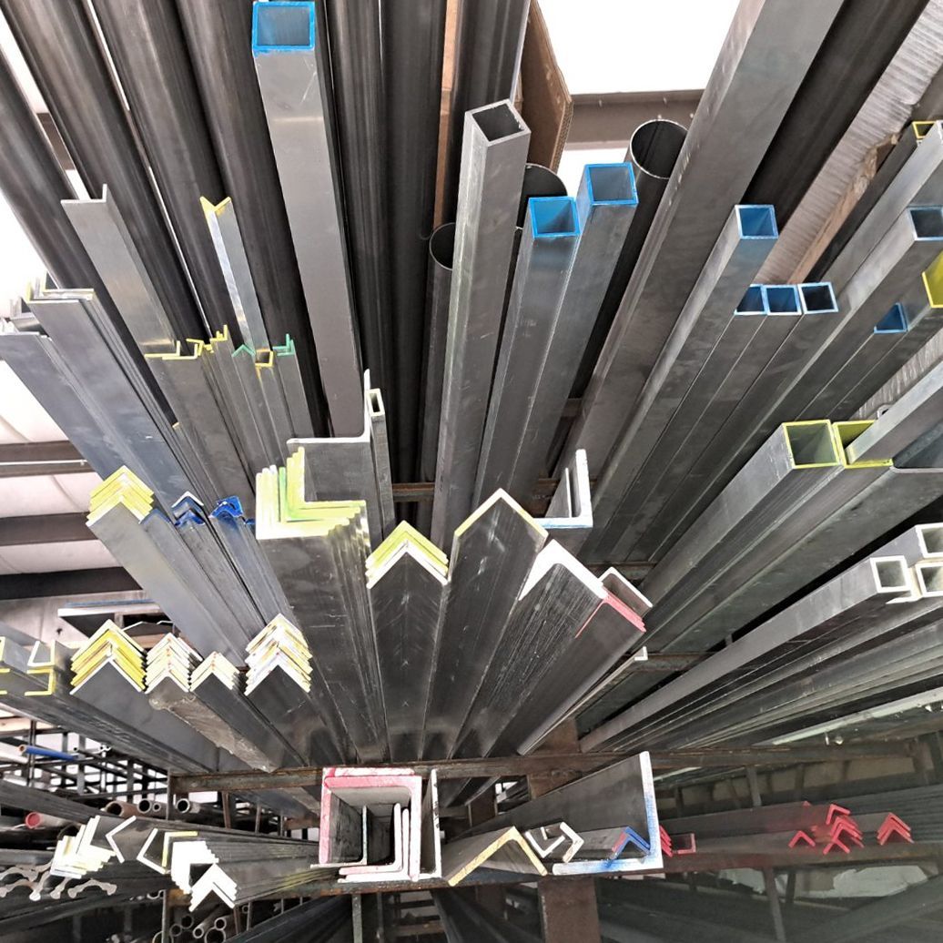 A bunch of metal pipes are stacked on top of each other