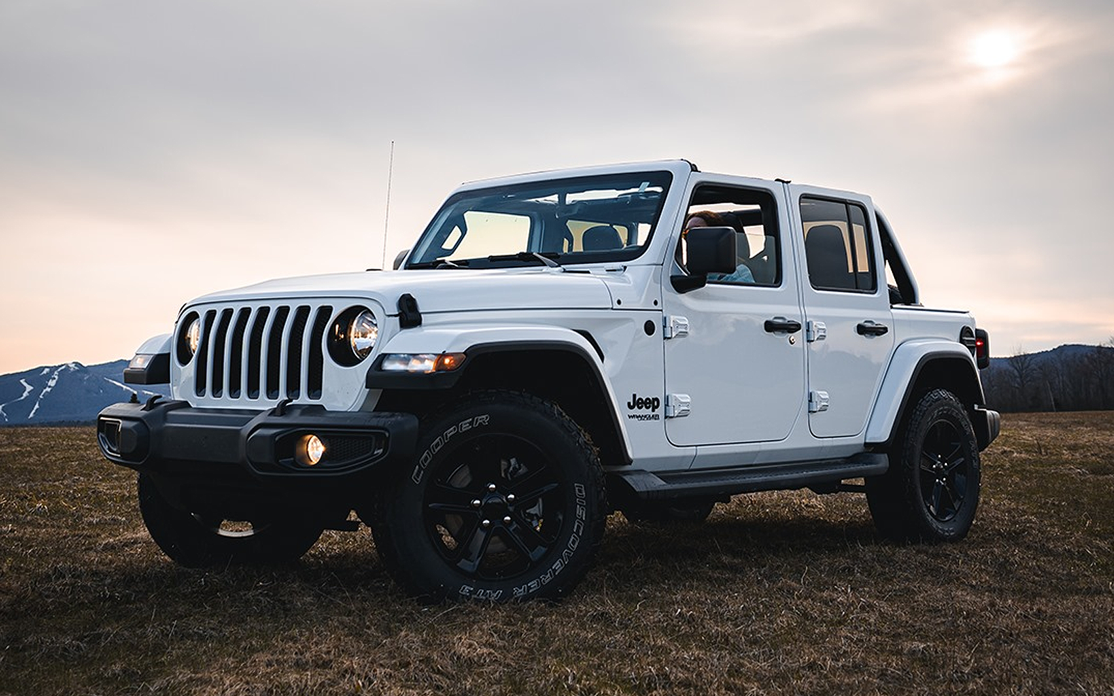 White Jeep pickup truck