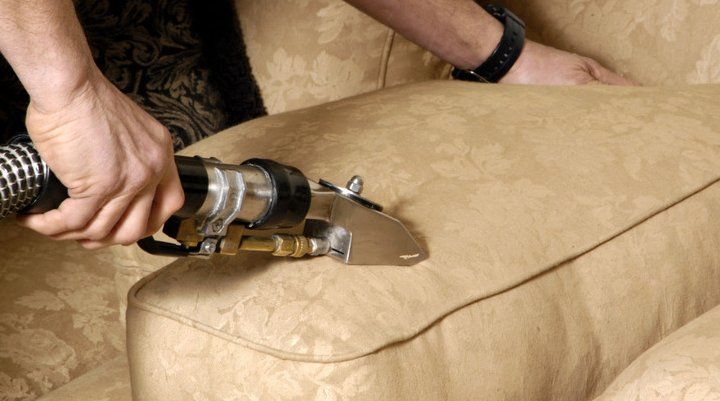 Close up of cleaning upholstery