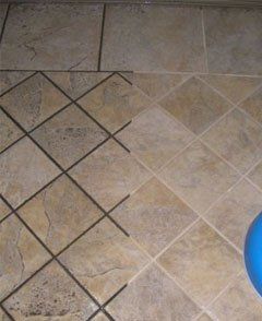 Picture of tile floor before and after cleaning