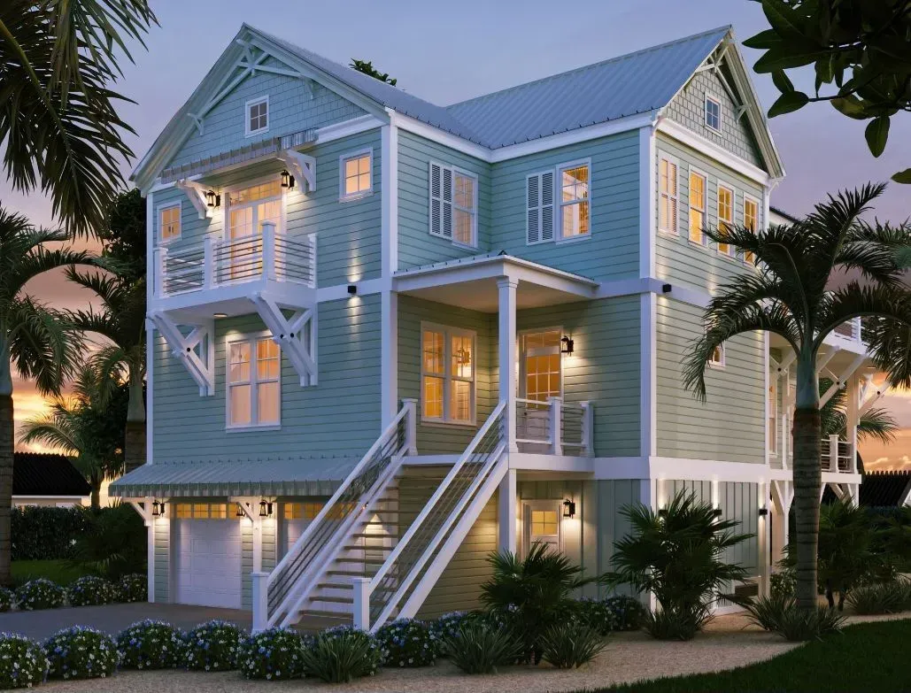 A light-blue, elevated beach house with a front staircase, wooden balcony, and palm trees at dusk.