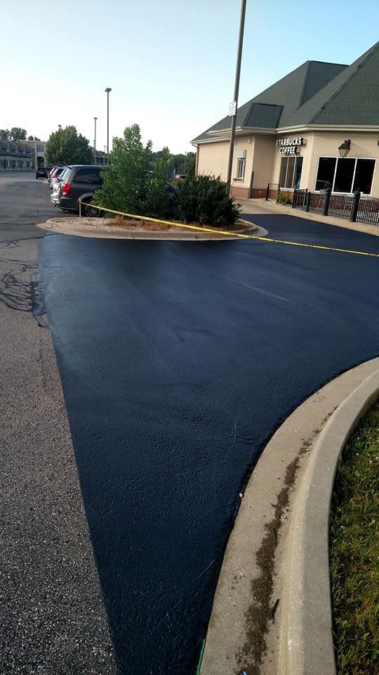 A newly installed seal coated driveway.