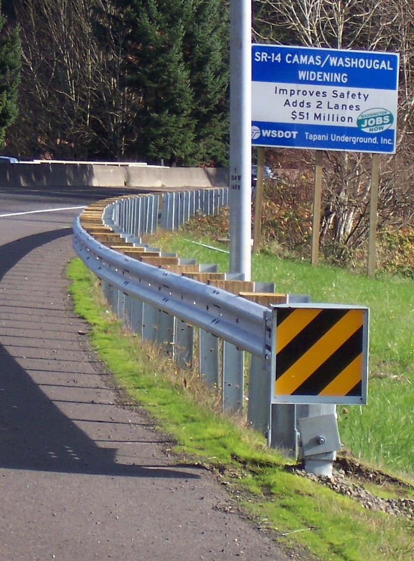 A road with a sign that says s14 camas washdougal working