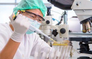 Laboratory people test dosage drop in the laboratory