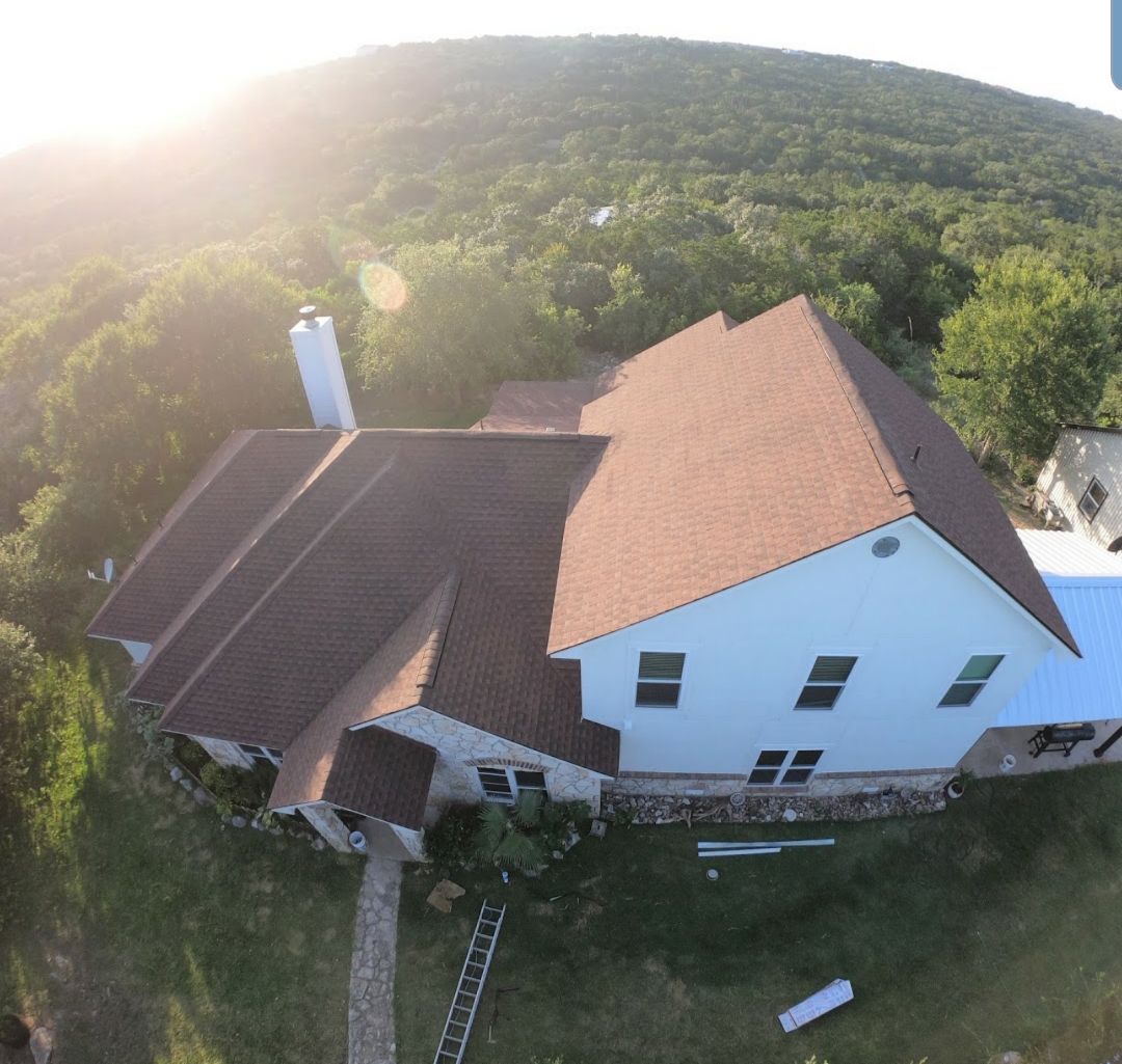 An aerial view of a building before and after being remodeled