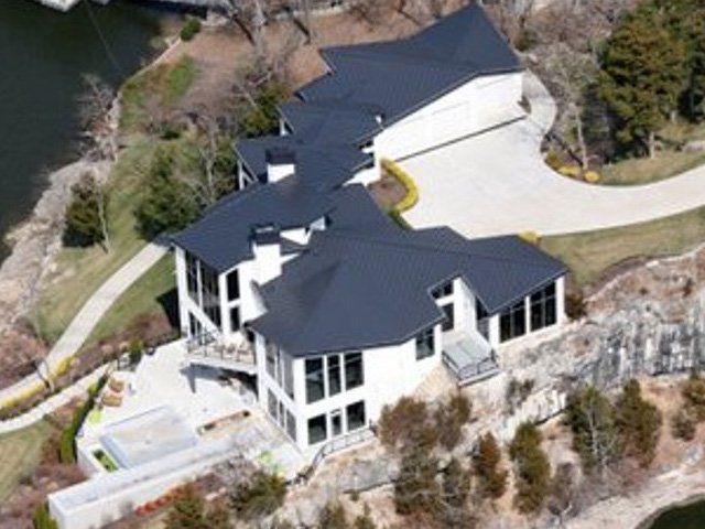 Big house with black roofing