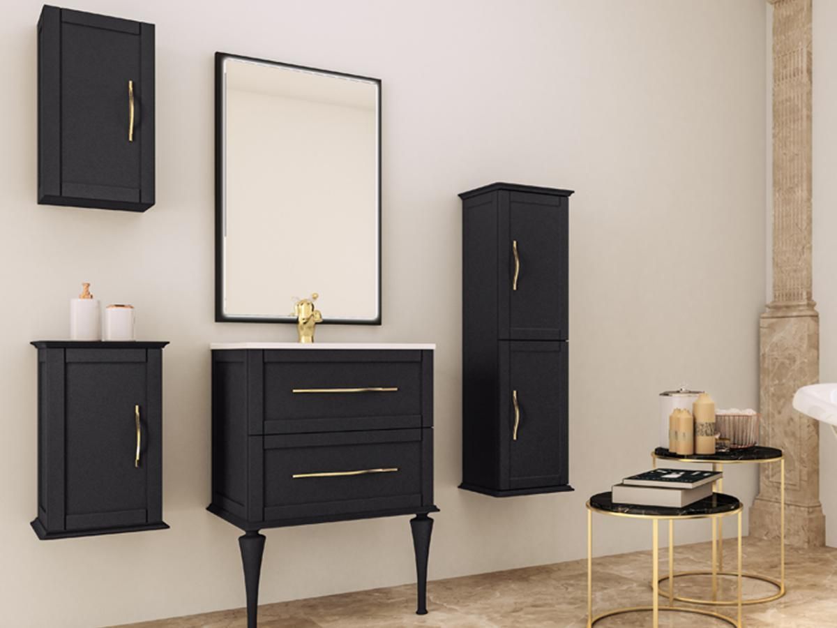 Black bathroom vanity set with a mirror, cabinets, and gold accents.