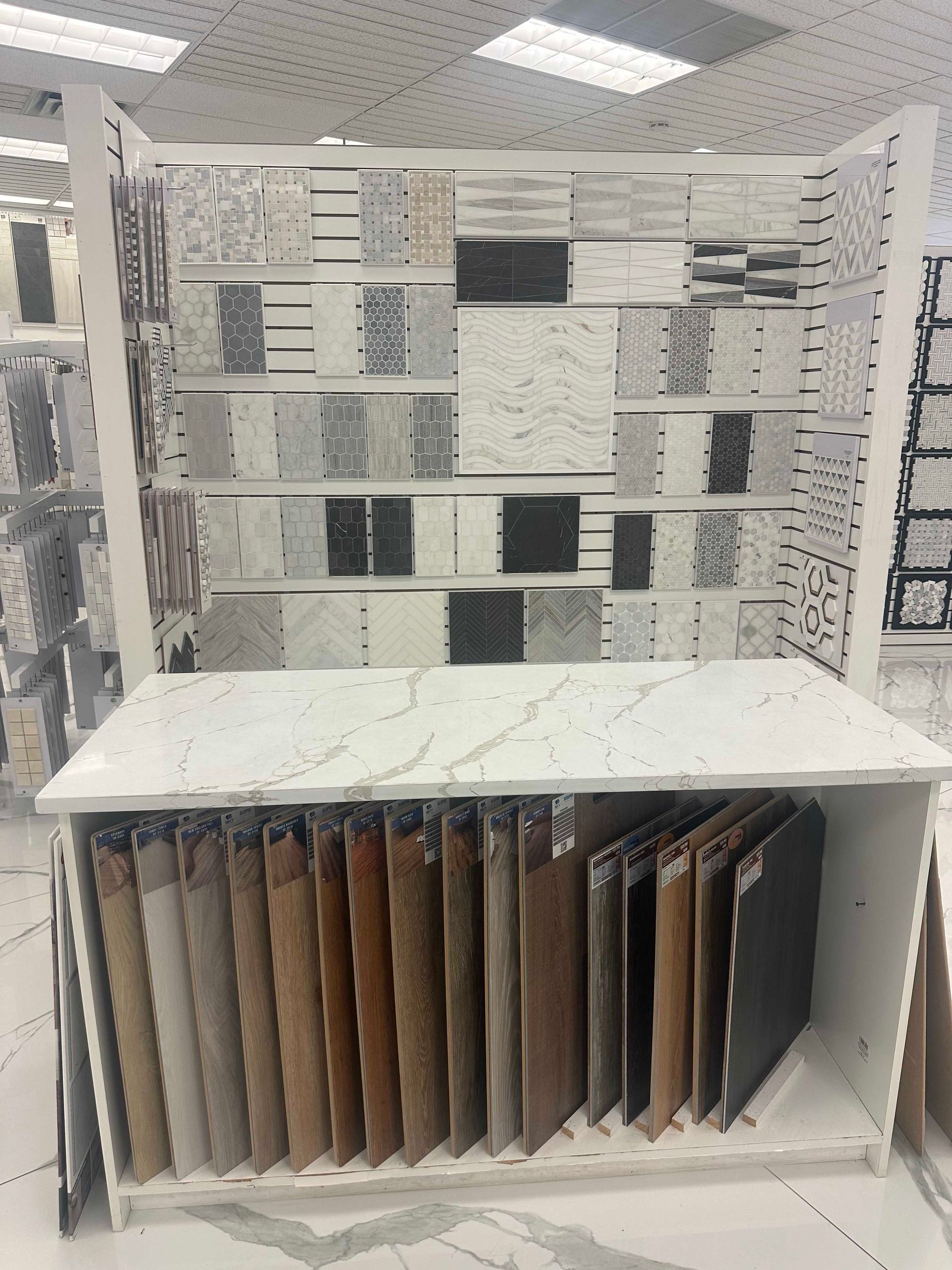 Tile display stand showcasing various tile samples in a store.