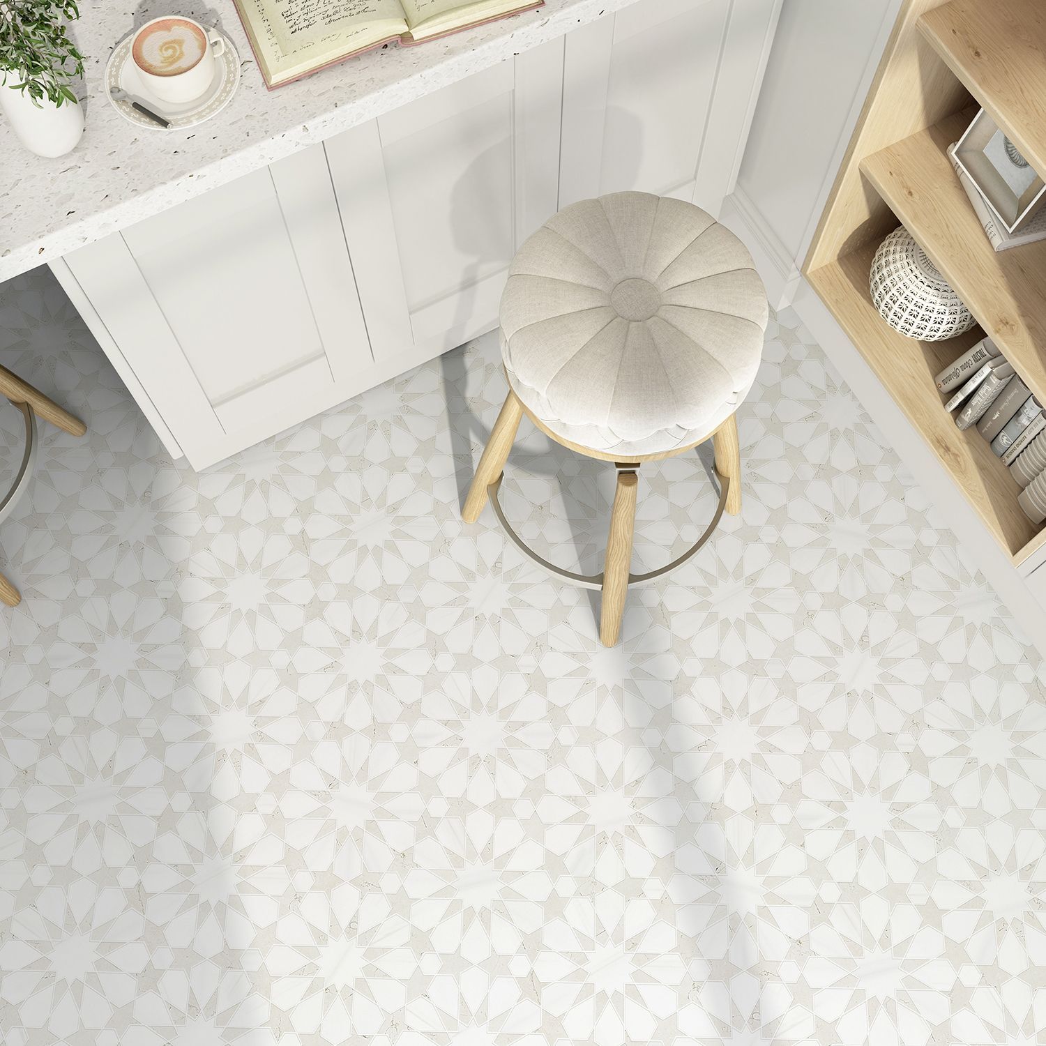 High-angle view of a kitchen with patterned flooring and a stool. White countertops and shelves are visible.