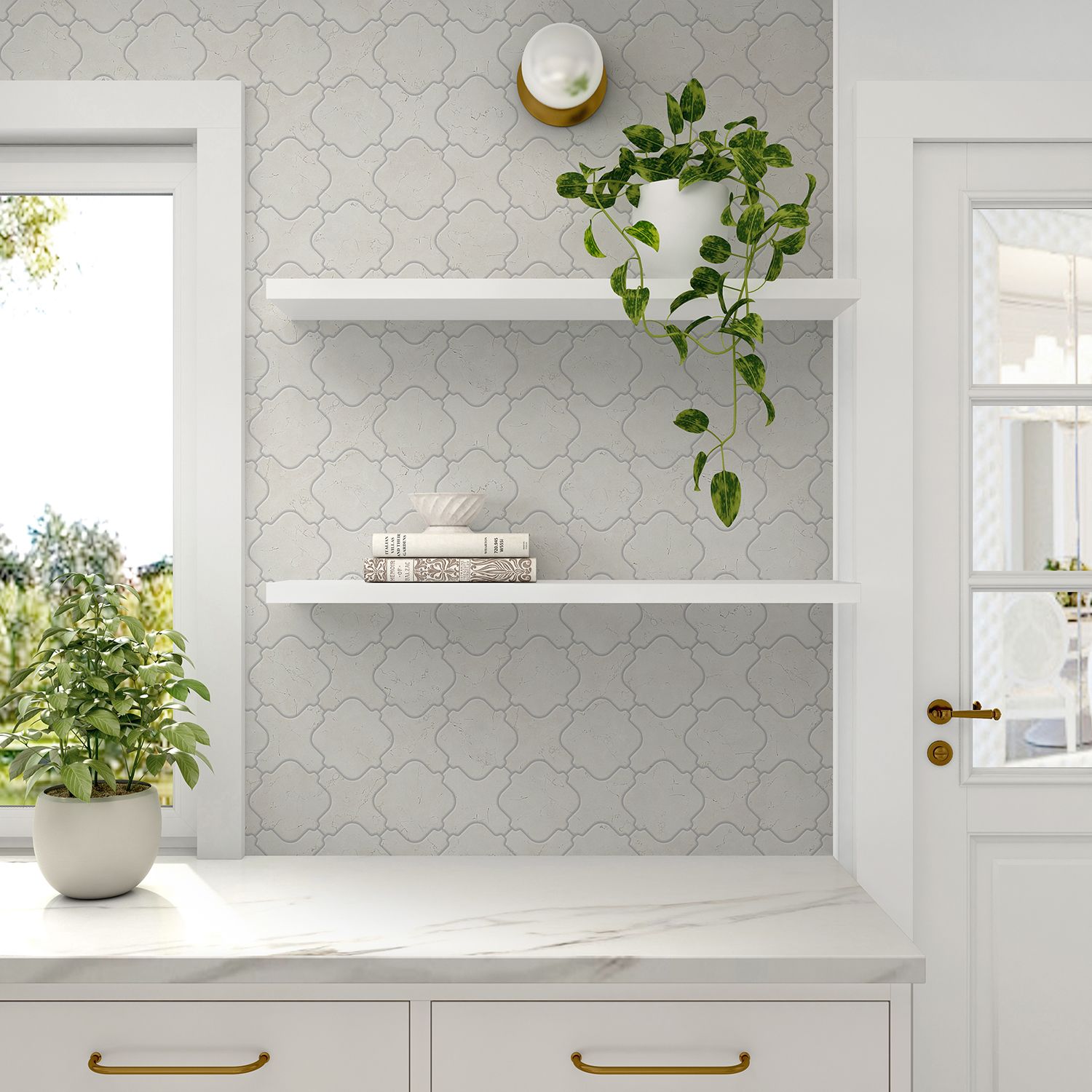 White shelves with plants and books in a room with patterned walls and a marble countertop.