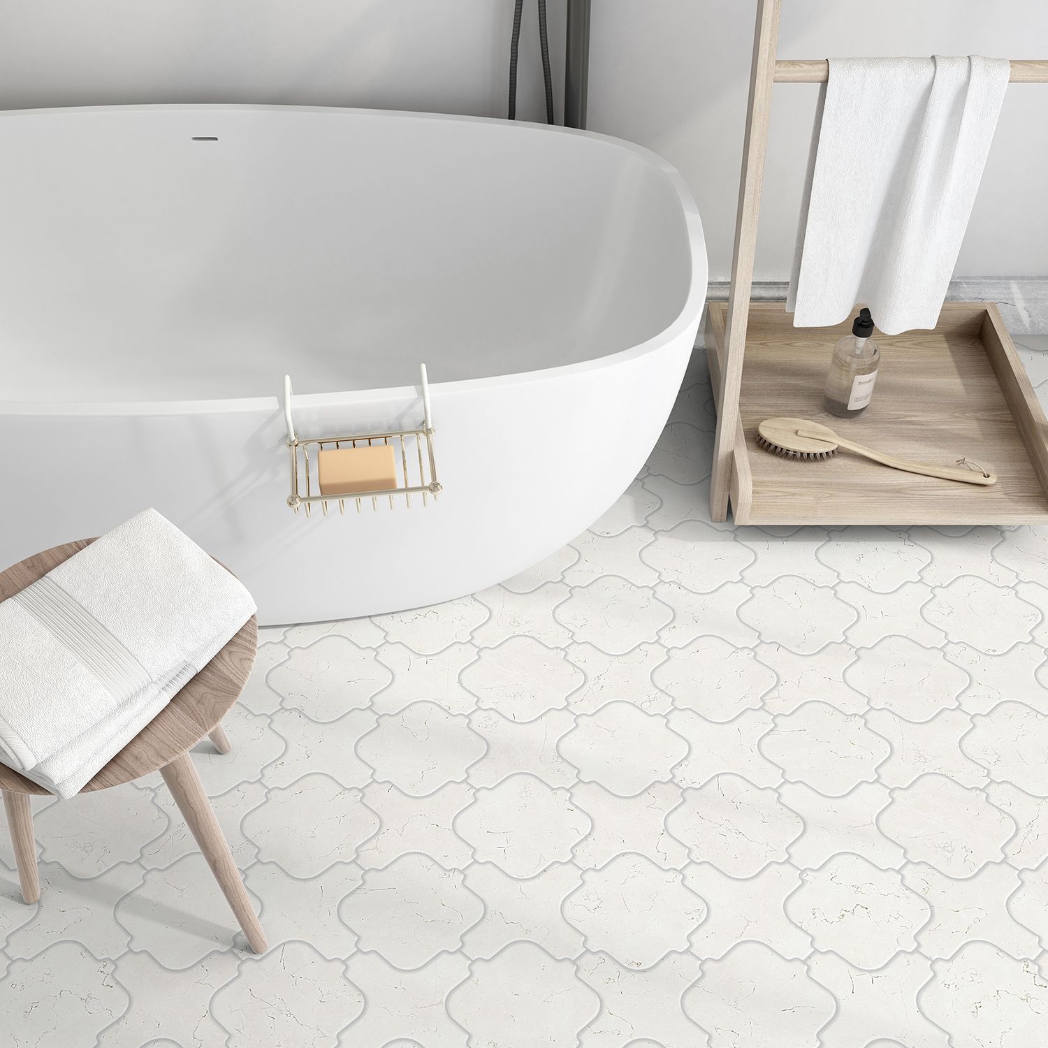 Bathroom with white soaking tub, patterned floor tiles, and towel on wooden stool.