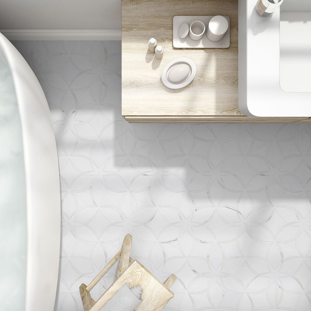 White bathroom, overhead view, includes a sink, soap dish, and a small wooden chair.