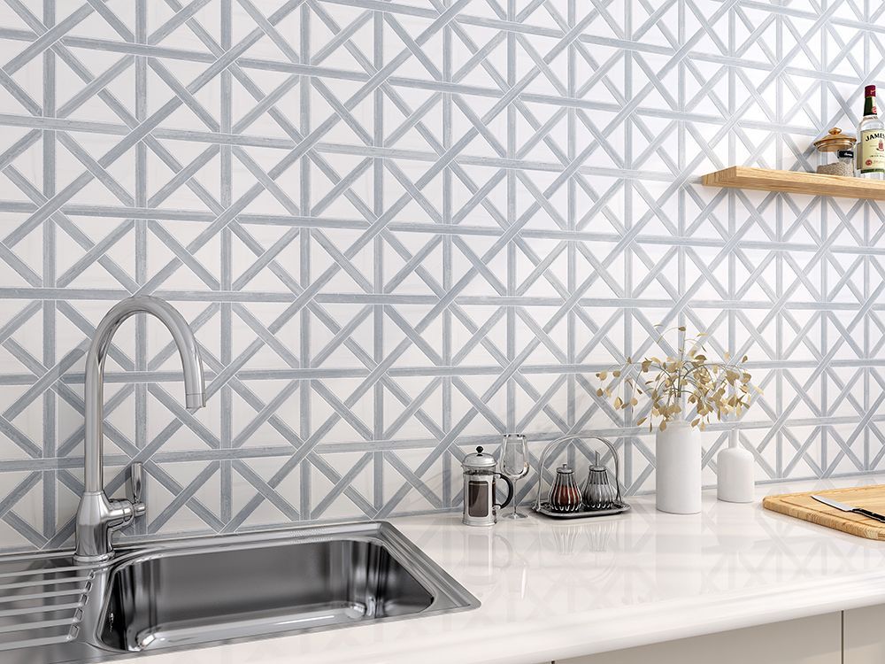 Kitchen with patterned tile backsplash, stainless sink, and wooden shelf holding items.