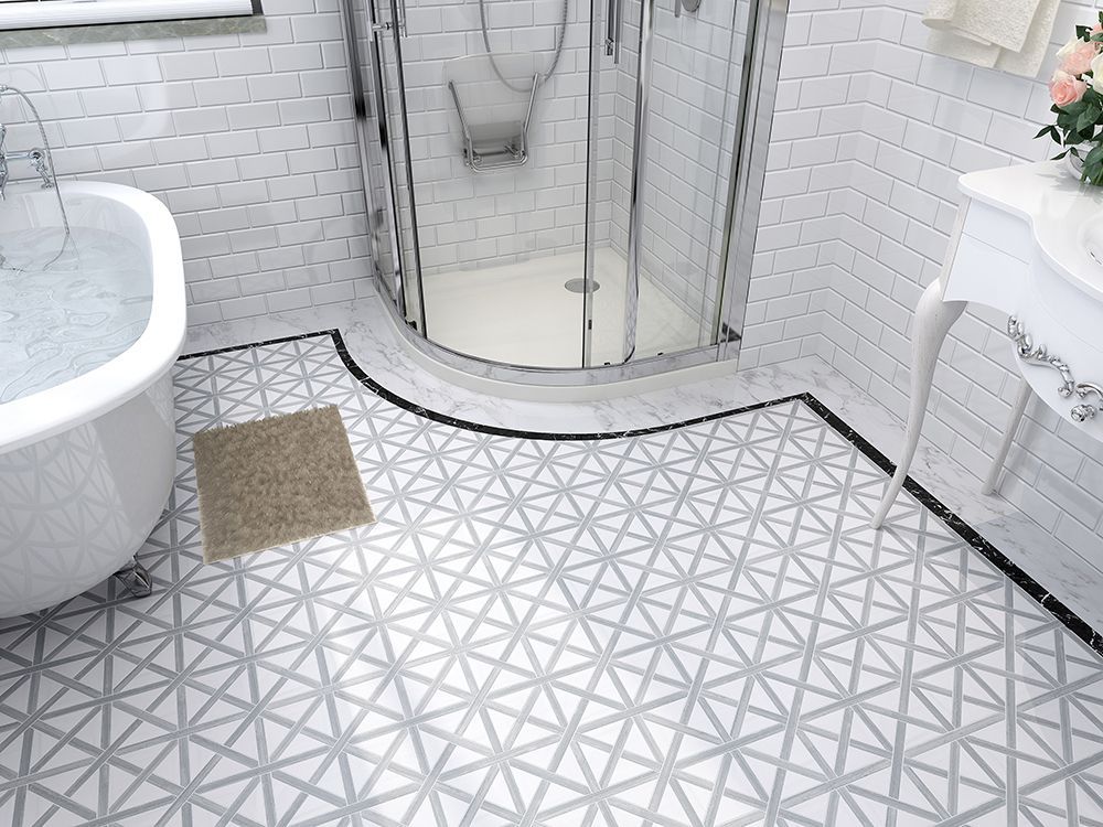 Bathroom with white and gray geometric patterned floor tiles, white tub, and curved shower.