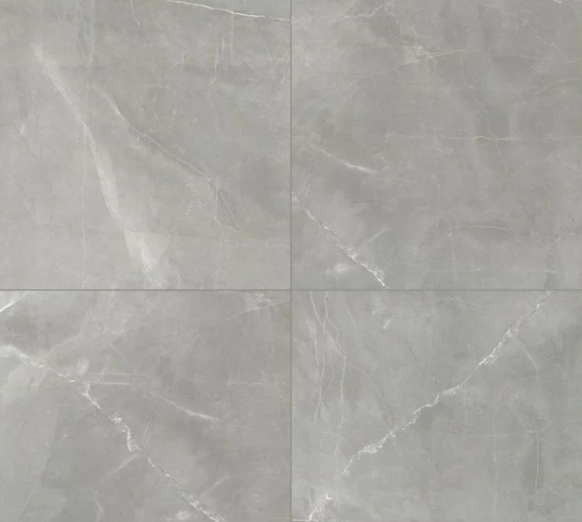 Four grey marble tiles with white veining.
