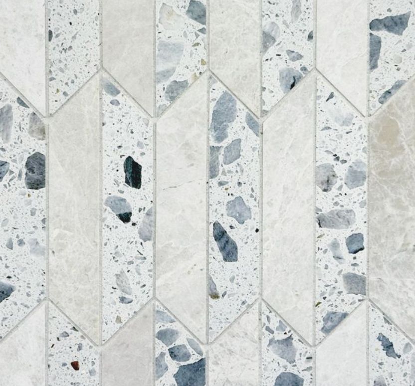Geometric tile pattern with light and dark gray terrazzo and off-white marble in a repeating design.