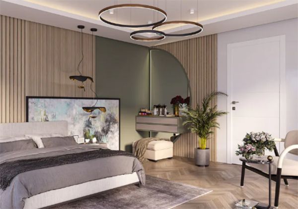 Bedroom interior with neutral color palette, bed, vanity, and modern lighting fixtures.