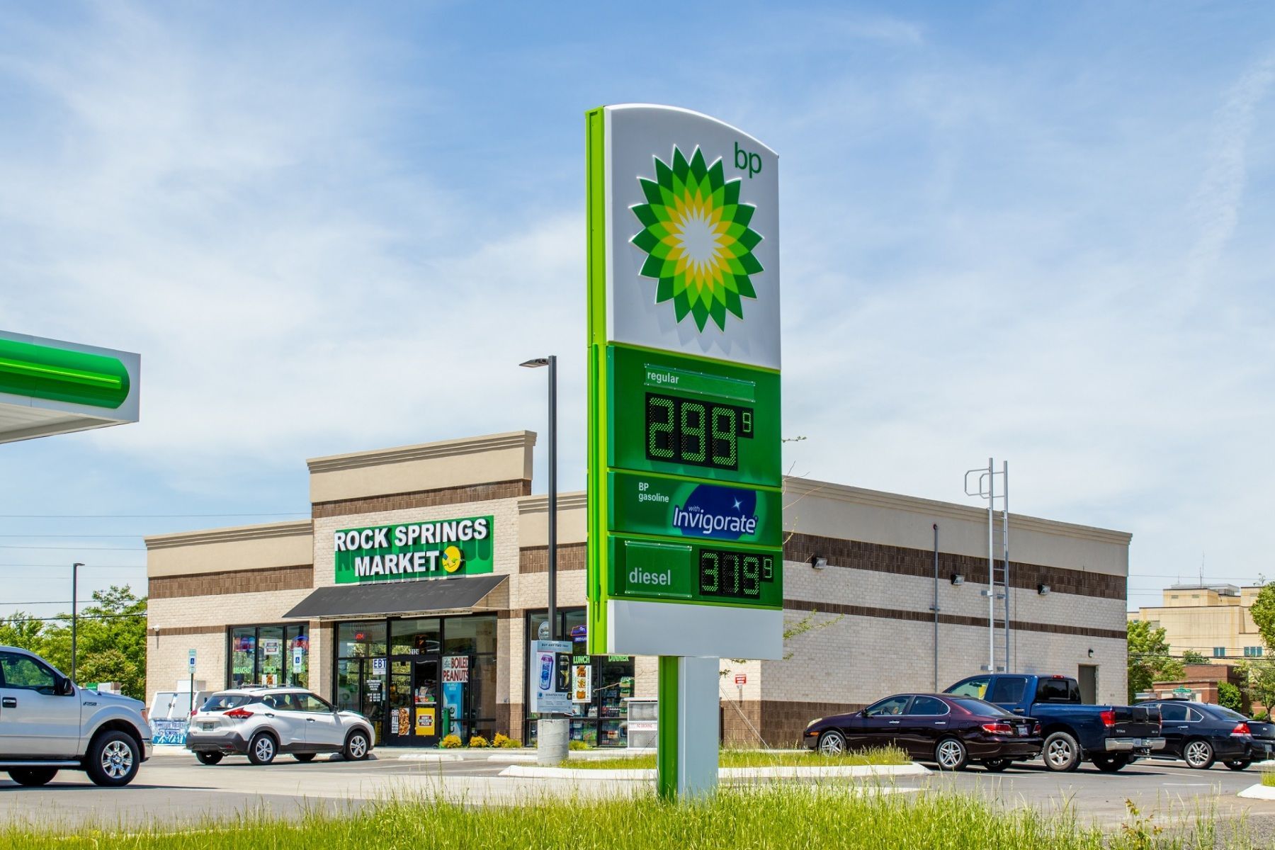 BP gas station with price sign displaying $2.99 per gallon, sunny day.