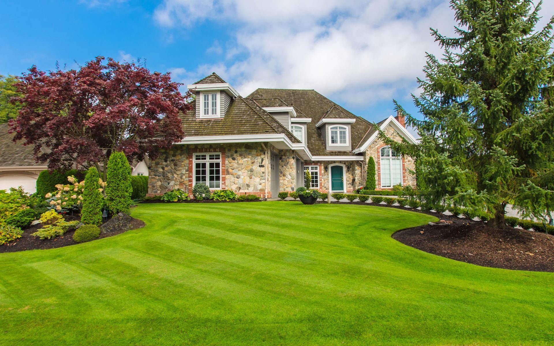 Lawn and Landscaping All Seasons Lawn Care Iowa City, IA