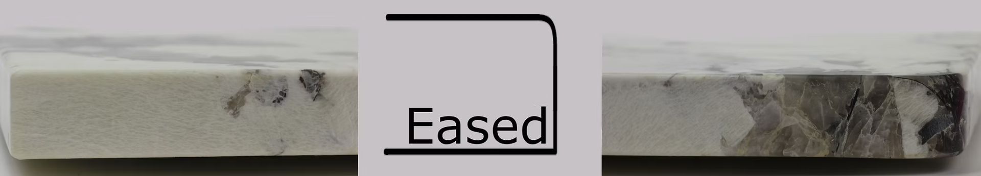 Eased edge of a light-colored stone slab with gray and black veining, positioned against a neutral backdrop.