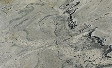 Swirling gray, white, and black patterned stone surface.