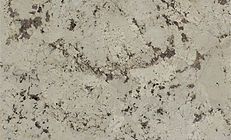 Creamy beige granite countertop with brown and gray speckles.