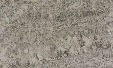 Textured gray surface with varying shades and patterns.