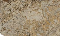 Close-up of granite countertop with tan, brown, and grey mottled patterns.