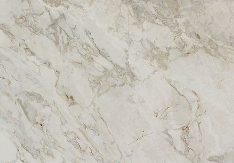 Cream-colored marble with gray veining and subtle tan accents.