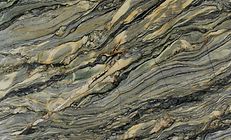 Swirled, textured stone surface with tan, gray, and black bands.