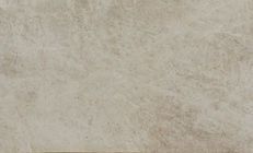 Beige marble tile with swirling patterns.