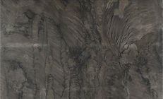 Dark gray marble with swirling patterns and varying shades of gray.